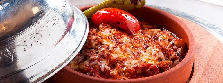 Güveç in an earthenware bowl